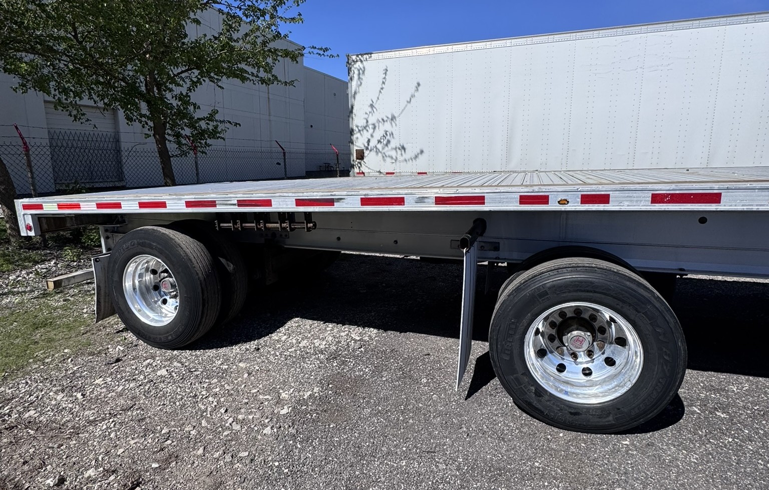 2023 Fontaine Revolution Aluminum Flatbed Trailer 53FT Air Ride Rear Axle Slide