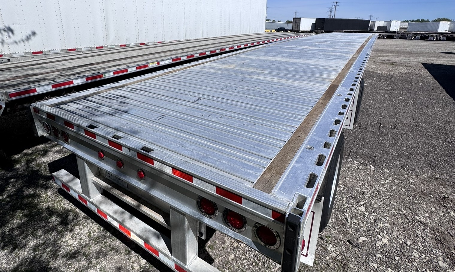 2023 Fontaine Revolution Aluminum Flatbed Trailer 53FT Air Ride Rear Axle Slide
